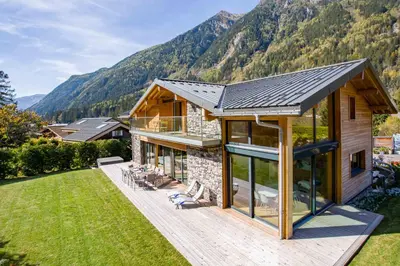 a house with a view of a mountain at Chalet Montana- Chamonix All Year in Chamonix-Mont-Blanc