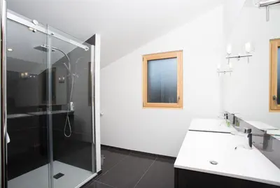 a bathroom with a shower and a sink at Chalet Montana- Chamonix All Year in Chamonix-Mont-Blanc