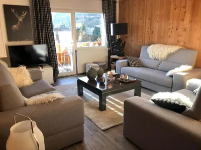 a living room with two couches and a coffee table at Bel appartement 3 pièces, 2 chambres, parking, Megeve Jaillet - FR-1-453-126 in Megève