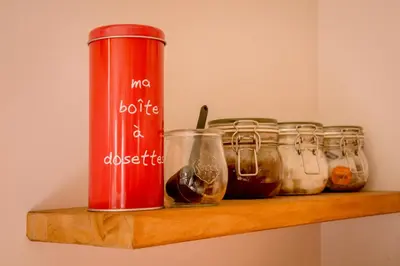 a picture on a wall with a vase on a dresser at Apartment La Tibolire in Sixt