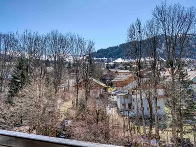 a view of a town with trees and buildings at Appartement confort 2 pièces Megève - Wifi, Parking - FR-1-453-125 in Megève
