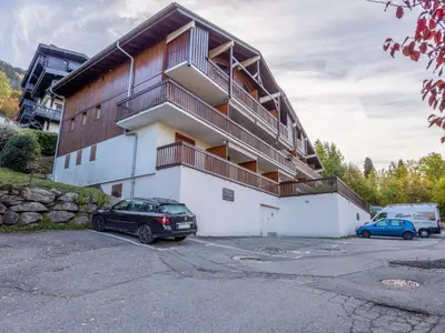 a building with balconies on the side of it at Apartment Martagon-2 by Interhome in Saint-Gervais-les-Bains