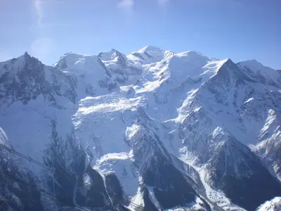 a mountain range with snow on it at Appartement chamonix face au mont blanc in Chamonix-Mont-Blanc