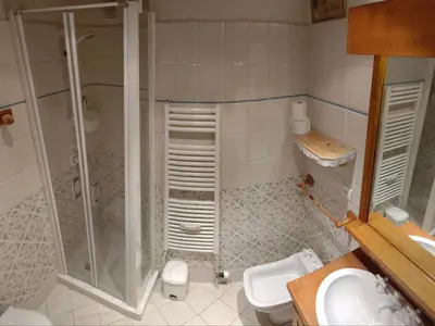a bathroom with a shower and a toilet and a sink at Appartement 2 chambres à Megève, proche Palais des Sports - FR-1-453-157 in Megève