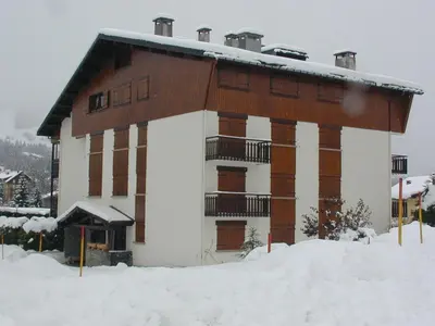 a building with snow on the ground in front of it at Appartement 2 chambres à Megève, proche Palais des Sports - FR-1-453-157 in Megève
