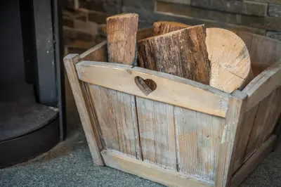 a wooden crate with a heart on top of it at Mintaka Apartment - Chamonix in Chamonix-Mont-Blanc