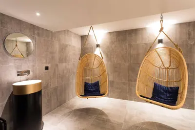 a bathroom with two hanging baskets at La Cordee 412 Apartment - Chamonix All Year in Chamonix-Mont-Blanc