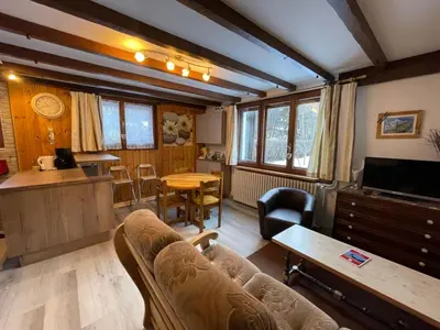 a small kitchen with a refrigerator and a stove at Apartment Maison Novel by Interhome in Chamonix-Mont-Blanc