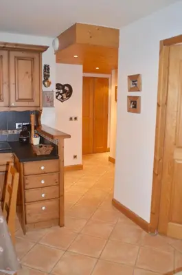 a kitchen with a sink and a counter top at ECRINS ETOILE C9 in Samoëns