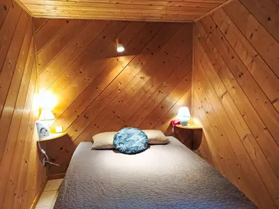 a large wooden house with snow on the ground at Apartment Rubigny by Interhome in Saint-Gervais-les-Bains