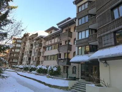 a snow covered street in front of a building at Apartment Jonquilles-7 by Interhome in Chamonix-Mont-Blanc