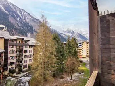 a view of the mountains from a balcony of a building at Apartment Le Grépon-1 by Interhome in Chamonix-Mont-Blanc
