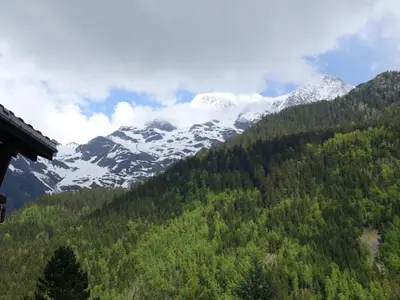 a mountain with snow capped mountains in the background at Apartment Le Brûlaz by Interhome in Les Contamines-Montjoie