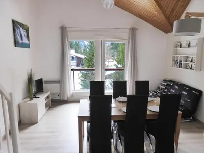 a view from the balcony of a resort in the snow at Apartment La Borgia A- B- C-10 by Interhome in Les Contamines-Montjoie