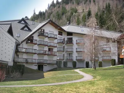 a view of a hotel with a mountain in the background at Apartment La Borgia A- B- C-10 by Interhome in Les Contamines-Montjoie