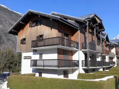 a building with balconies on the side of it at Studio Les Chamois by Interhome in Les Houches