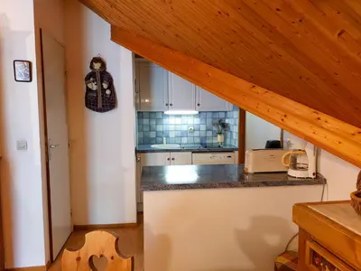a kitchen with a counter top and a sink at Apartment Les Combettes D et E by Interhome in Les Contamines-Montjoie