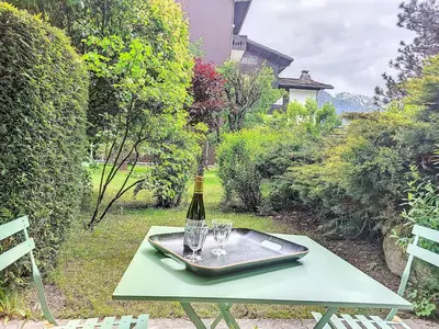 a kitchen and a living room with a couch at Studio Clos du Savoy-22 by Interhome in Chamonix-Mont-Blanc