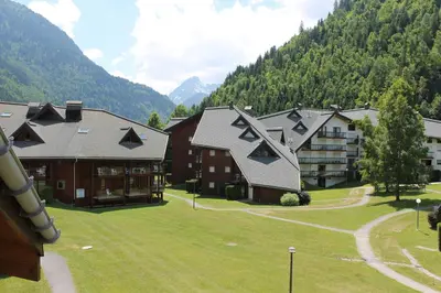 an aerial view of a resort in the mountains at L'Enclave in Les Contamines-Montjoie