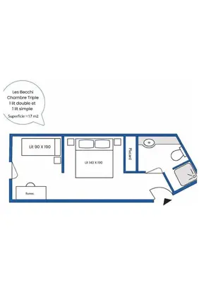 a bedroom with a large bed and a staircase at AEC Village Vacances - Les Becchi in Samoëns