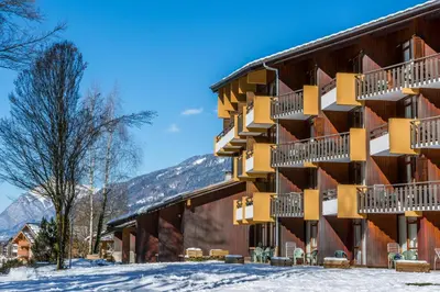 a lobby of a hospital with a reception counter at AEC Village Vacances - Les Becchi in Samoëns