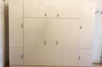 a white closet with white cabinets in a room at Marie Paradis Studio Apt 15 in Chamonix-Mont-Blanc