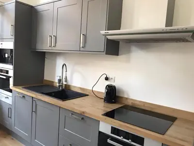 a kitchen with a sink and a counter top at Le Mont Joly in Saint-Gervais-les-Bains