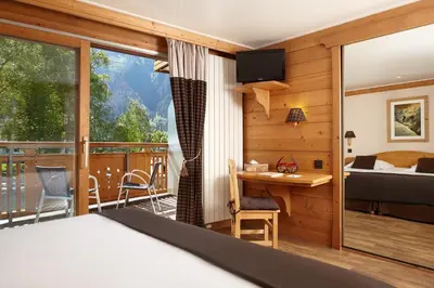 a hotel in the mountains with snow at Hôtel de L'Arve by HappyCulture in Chamonix-Mont-Blanc