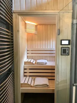 a small sauna with two beds in it at CHALET ALBA in Chamonix-Mont-Blanc