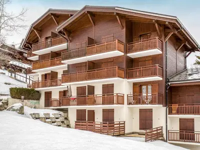 a view of a snow covered yard with a ski lift at Apartment La piste A by Interhome in Saint-Gervais-les-Bains