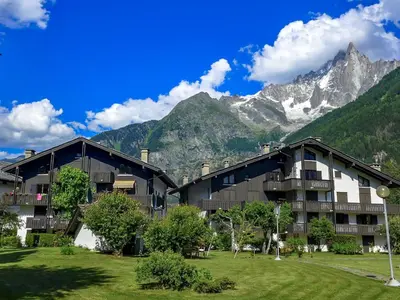 a resort with a mountain in the background at Apartment Champraz-15 by Interhome in Chamonix-Mont-Blanc