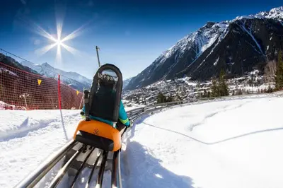 a ski lift in the snow on a mountain at Appartement Le Mazot Vue Mont Blanc in Chamonix-Mont-Blanc