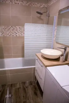 a bathroom with a sink and a bath tub at Castel des roches Leal Julien in Saint-Gervais-les-Bains