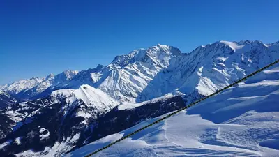 an aerial view of a mountain range with snow at Castel des roches Leal Julien in Saint-Gervais-les-Bains