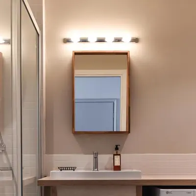 a bathroom with a sink and a mirror at Appartement La Vallée Blanche avec parking gratuit in Chamonix-Mont-Blanc