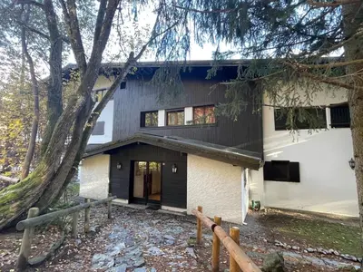 a house with a black and white exterior at Apartment Les Charmoz-3 by Interhome in Chamonix-Mont-Blanc