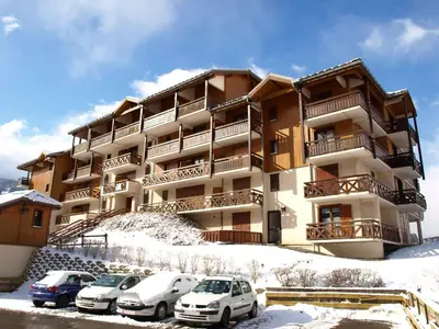 an apartment building with balconies on a hill at Apartment Les Hauts de Saint Gervais-3 by Interhome in Saint-Gervais-les-Bains