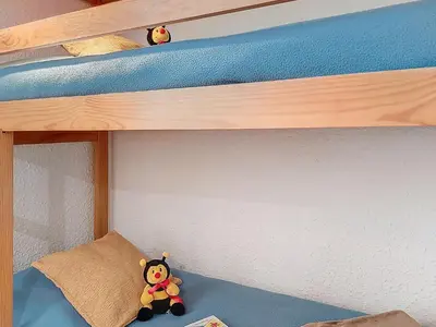 a bedroom with a bed with a tray on it at Apartment Les Hauts de Saint Gervais-3 by Interhome in Saint-Gervais-les-Bains