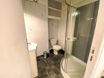 a bathroom with a toilet and a glass shower at Studio Arve 1 et 2-3 by Interhome in Chamonix-Mont-Blanc