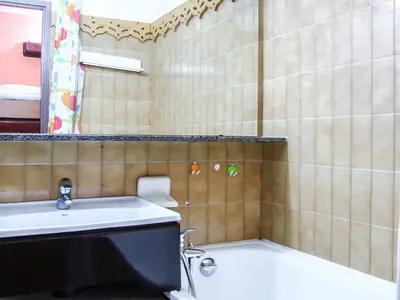 a bathroom with a sink and a toilet and a tub at Studio Le Grépon-3 by Interhome in Chamonix-Mont-Blanc