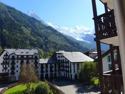 a view of a resort with mountains in the background at Apartment La Forclaz-2 by Interhome in Chamonix-Mont-Blanc