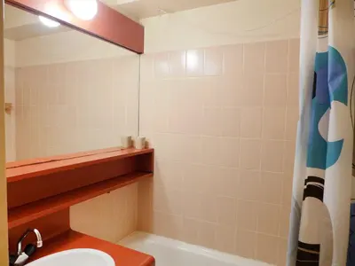a bathroom with a sink and a toilet and a shower at Apartment La Forclaz-2 by Interhome in Chamonix-Mont-Blanc