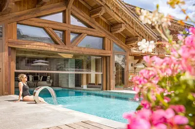 a table with breakfast foods and drinks on it at Armancette - The Leading Hotels of the World in Saint-Gervais-les-Bains