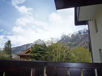 a balcony with a view of a mountain at Apartment Clos du Savoy-15 by Interhome in Chamonix-Mont-Blanc