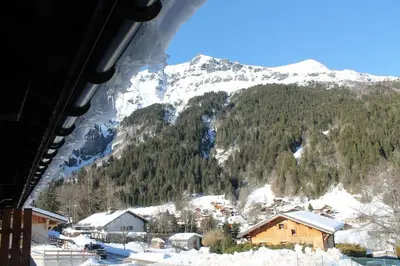 a view of a snow covered mountain from a train at Chalet Les Contamines in Les Contamines-Montjoie