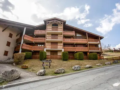 a building with rocks in front of it at Apartment Aiguille du midi by Interhome in Saint-Gervais-les-Bains