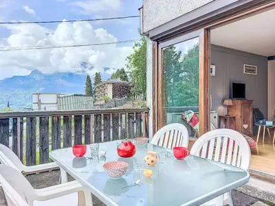 a white building with a balcony in the snow at Apartment Le Sporting-3 by Interhome in Saint-Gervais-les-Bains
