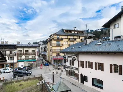 a view of a city with buildings and a street at Appartement rénové 3 ch, centre Megève, parking, wifi - FR-1-453-178 in Megève