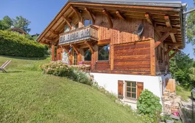 a large wooden house on top of a hill at Marie Mont Blanc vue Mont Blanc in Saint-Gervais-les-Bains