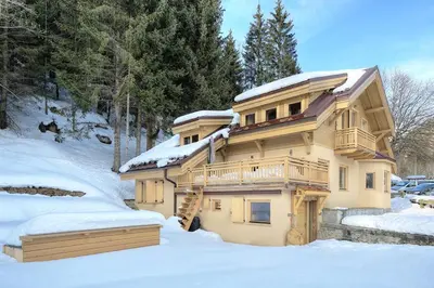 a large house with snow on the ground at 